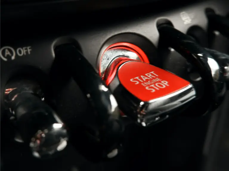 Car engine start-stop button close-up